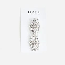 Clips gris amovibles en strass^Texto