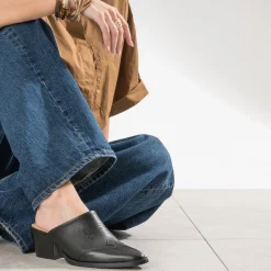 Mule-santiag e cuir^Texto Online