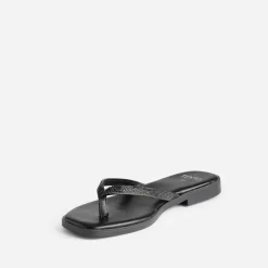 Mule-tong e brides strassées^Texto Online